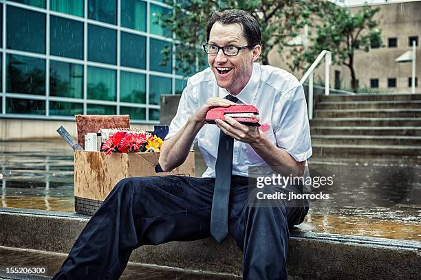 unemployed businessman plots revenge - staples office stockfoto's en -beelden