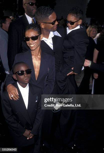 Actress Jada Pinkett, actor Will Smith, son Trey Smith and nephew attend the "Men in Black" Hollywood Premiere on June 25, 1997 at Pacific's Cinerama...