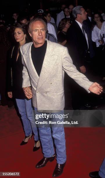 Actor James Caan and Ingrid Hajek attend the premiere of "Batman Returns" on June 16, 1992 at Mann Chinese Theater in Hollywood, California.