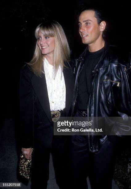Singer Olivia Newton-John and husband Matt Lattanzi attend John Reid's 40th Birthday Party on September 9, 1989 in Beverly Hills, California.