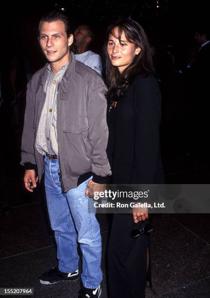 Actor Christian Slater and girlfriend Nina Huang attend the "Three of Hearts" West Hollywood Premiere on April 29, 1993 at the DGA Theatre in West...