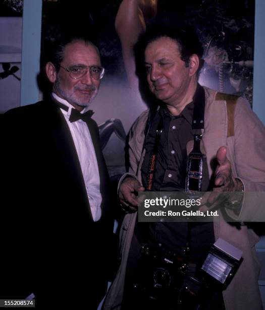 Photographers Garry Gross and Ron Galella attend Garry Gross Photography Exhibition on June 27, 1985 at the Limelight in New York City.