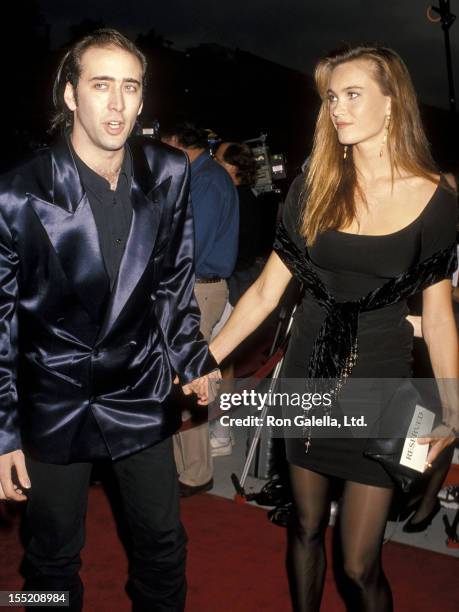 Actor Nicolas Cage and girlfriend Lisa Stothard attend the "Wild at Heart" Century City Premiere on August 13, 1990 at Cineplex Odeon Century Plaza...