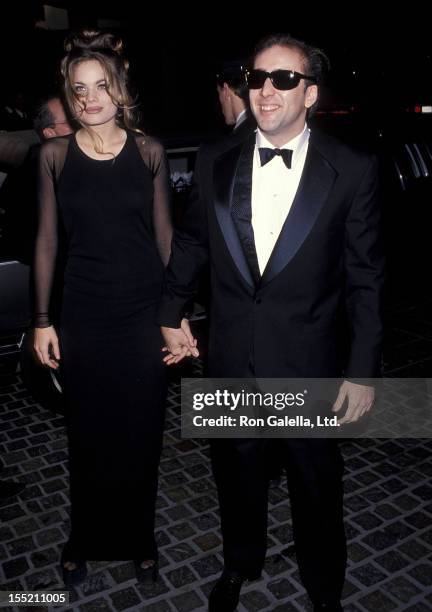 Actor Nicolas Cage and girlfriend Kristen Zang attend the 50th Annual Golden Globe Awards on January 23, 1993 at Beverly Hilton Hotel in Beverly...