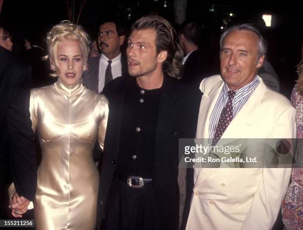 Actress Patricia Arquette, actor Christian Slater and actor Dennis Hopper attend the "True Romance" Hollywood Premiere on September 8, 1993 at Mann's...