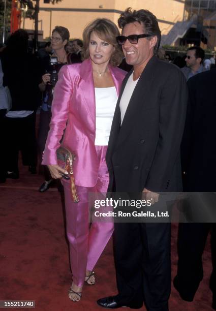 Actress Raquel Welch and husband Richard Palmer attend the "Bowfinger" Universal City Premiere on August 10, 1999 at Universal Amphitheatre in...