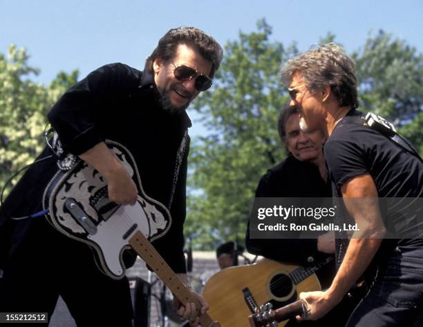 Musician Waylon Jennings, Johnny Cash and Kris Kristofferson attend Highwaymen Concert on May 23, 1993 at Central Park in New York City.