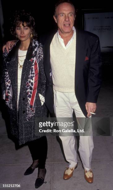 Actor James Caan and Ingrid Hajek attend the premiere of "Godfather III" on December 20, 1990 at the Academy Theater in Beverly Hills, California.