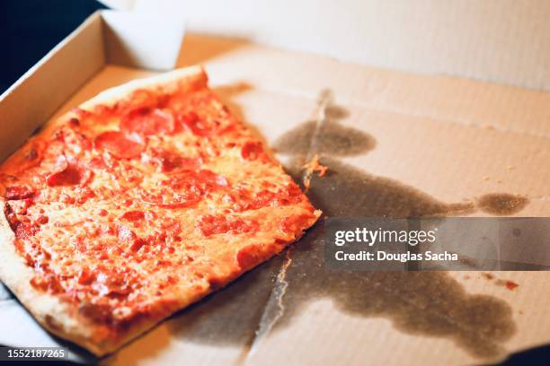 greasy pizza in a delivery box - body issue celebration party stock pictures, royalty-free photos & images