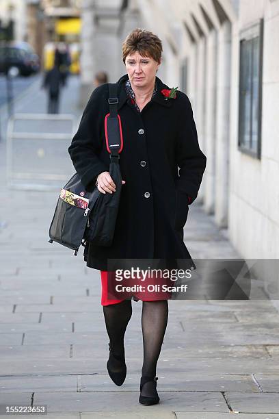 April Casburn, the former head of Scotland Yard's National Terrorist Financial Investigation Unit, leaves the Old Bailey after appearing before the...