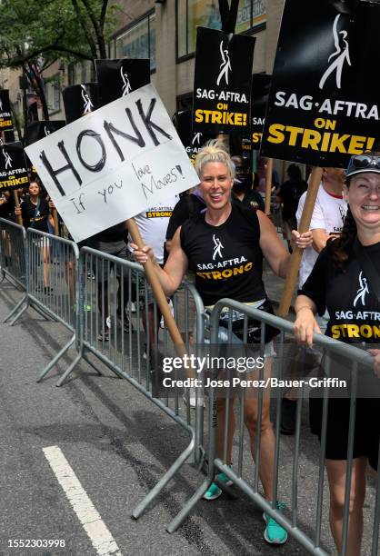 Melody Garcia is seen picketing with SAG-AFTRA and WGA members in Lower Manhattan on July 24, 2023 in New York City.