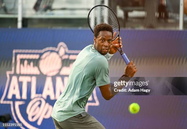 Gael Monfils of France hits a shot against Thanasi Kokkinakis during the first round of the ATP Atlanta Open at Atlantic Station on July 24, 2023 in...