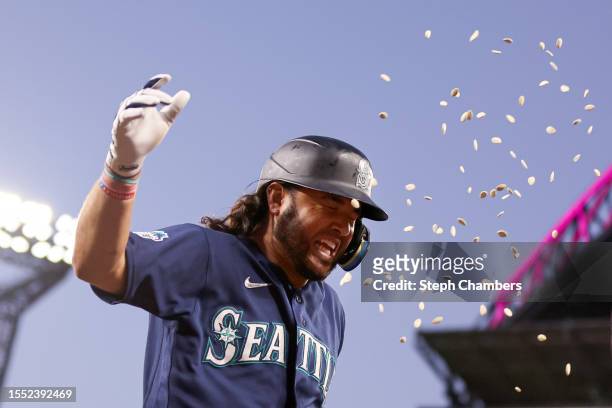 Eugenio Suarez of the Seattle Mariners celebrates his two run home run against the Minnesota Twins during the seventh inning at T-Mobile Park on July...