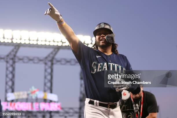 Eugenio Suarez of the Seattle Mariners celebrates his two run home run against the Minnesota Twins during the seventh inning at T-Mobile Park on July...