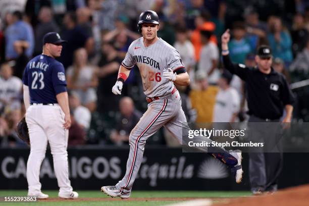 Max Kepler of the Minnesota Twins celebrates his three run home run during the ninth inning against the Seattle Marinersat T-Mobile Park on July 17,...