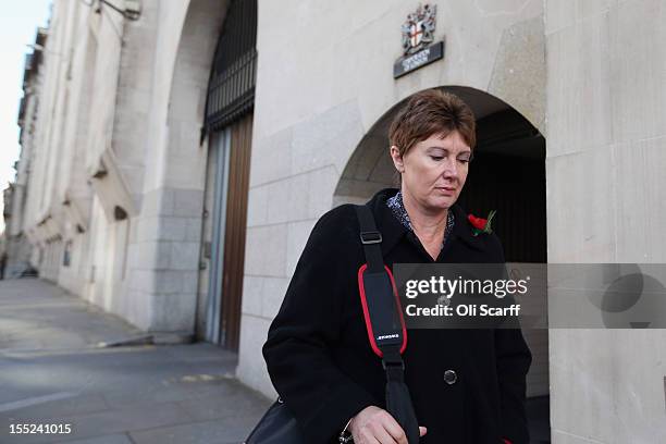 April Casburn, the former head of Scotland Yard's National Terrorist Financial Investigation Unit, leaves the Old Bailey after appearing before the...