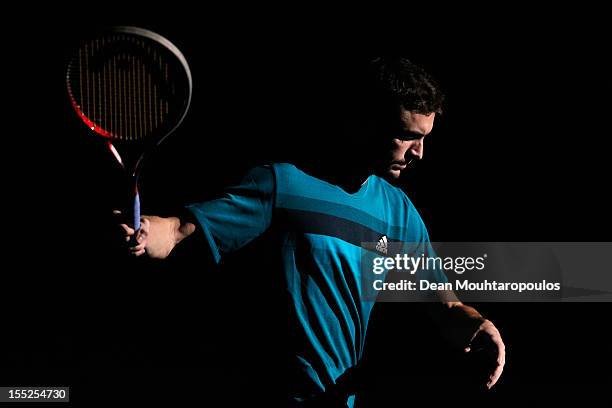 Gilles Simon of France warms up prior to his match against Tomas Berdych of Czech Republic in the Quarter Finals on day 5 of the BNP Paribas Masters...