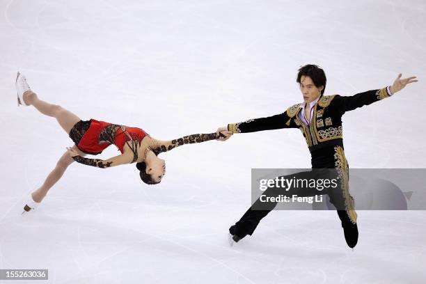 Qing Pang and Jian Tong of China skate in Pairs Short Program during Cup of China ISU Grand Prix of Figure Skating 2012 at the Oriental Sports Center...