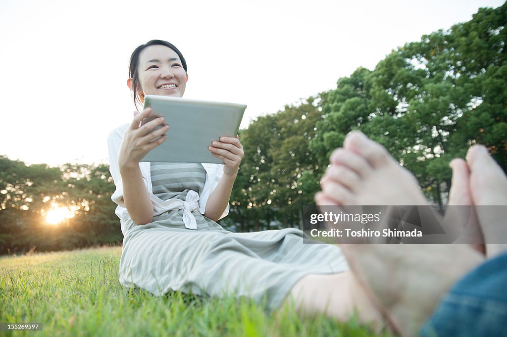 Woman with digital tablet