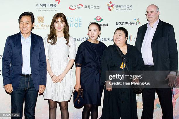 Festival director Ahn Sung-Ki, actors Yoon Eun-Hye and Kang Soo-Yeon, Producer Tomiyama Katsue and Tony Rayns appear on the red carpet at the 2012...