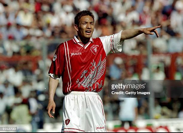 Hidetoshi Nakata of Perugia in action during the Serie A match against AC Milan at the Stadio Renato Curi in Perugia, Italy. The match finished in a...