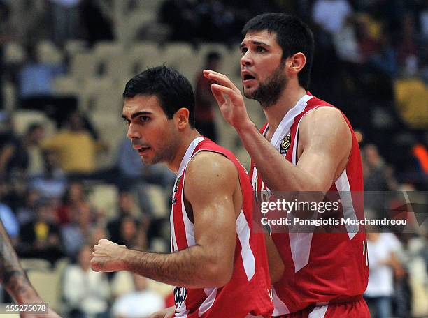 Kostas Sloukas, #10 and Kostas Papanikolau, #16 of Olympiacos Piraeus react during the 2012-2013 Turkish Airlines Euroleague Regular Season Game Day...