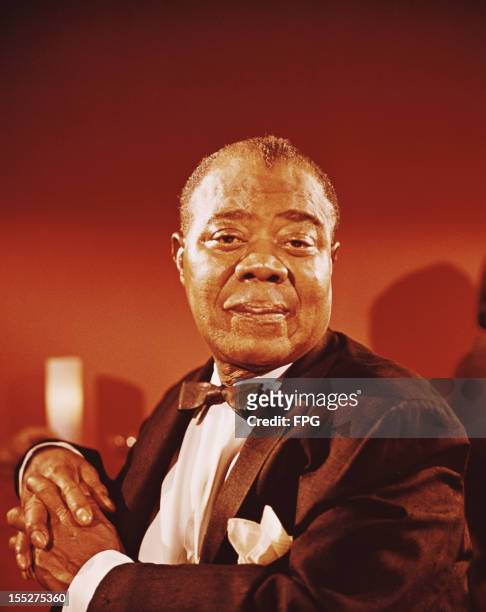 American jazz trumpeter and singer Louis Armstrong , circa 1955.