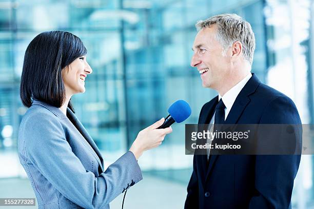 interview with the ceo - television interview stock pictures, royalty-free photos & images