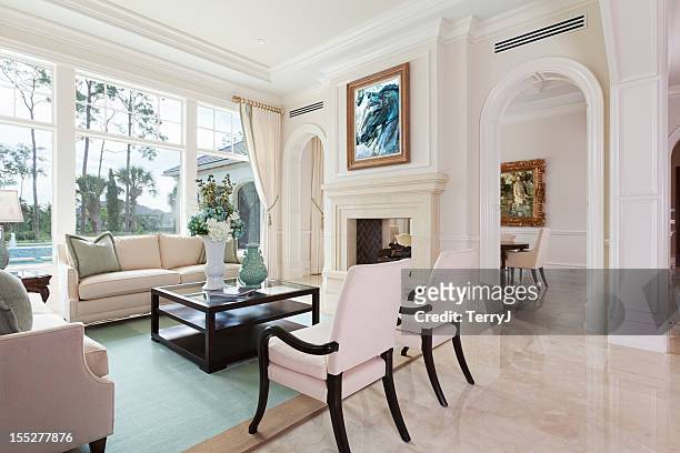 estate living - luxury mansion interior stock pictures, royalty-free photos & images