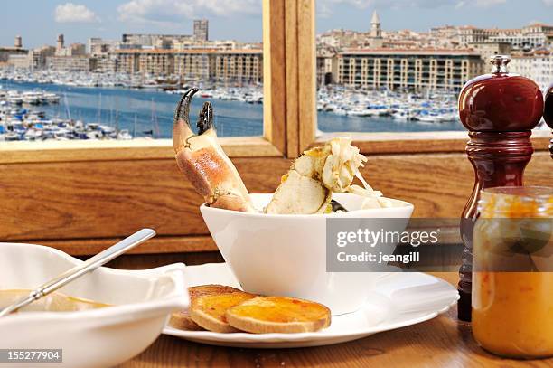 bouillabaisse con vista de marsella - marseille fotografías e imágenes de stock