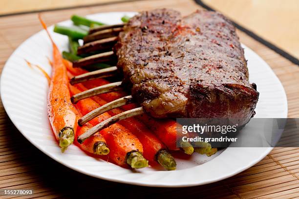 rack of lamb with carrots and green beans - rib food stock pictures, royalty-free photos & images