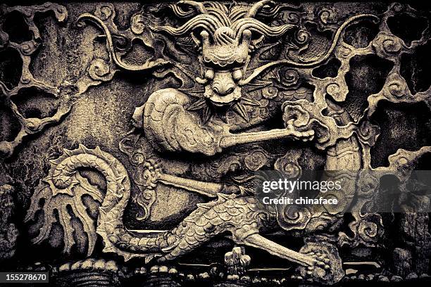 chinese dragon - carving sculpture stock pictures, royalty-free photos & images