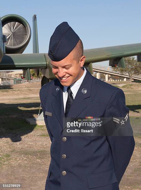 airman in uniform with a casual unposed smile - us air force stock pictures, royalty-free photos & images
