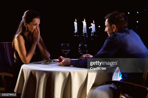 romantic proposing - candle holder stock pictures, royalty-free photos & images