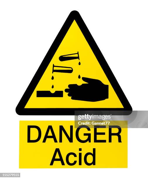 señal de peligro en blanco ácido - acid fotografías e imágenes de stock