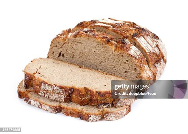 crusty fette di pane di grano intero isolato su bianco - loaf of bread foto e immagini stock