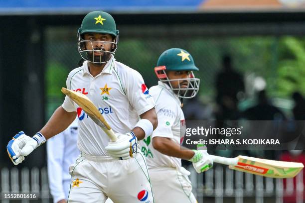 Pakistan's Abdullah Shafique and Babar Azam run between the wickets during the second day of the second and final cricket Test match between Pakistan...