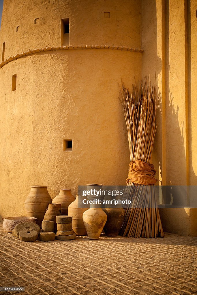 Old arabic pots on cobblestones