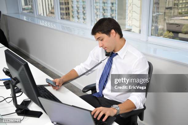 multitasking office worker - input device stock pictures, royalty-free photos & images