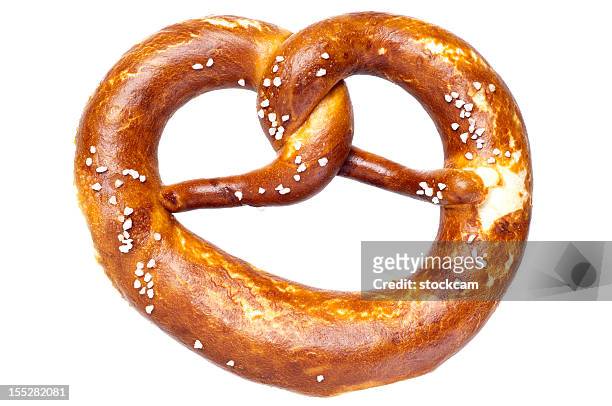 german bread pretzel on a white background - german culture stock pictures, royalty-free photos & images