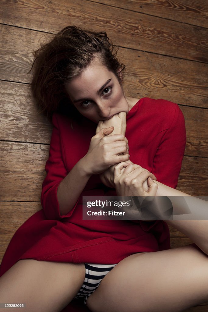 Red haired model posing indoor