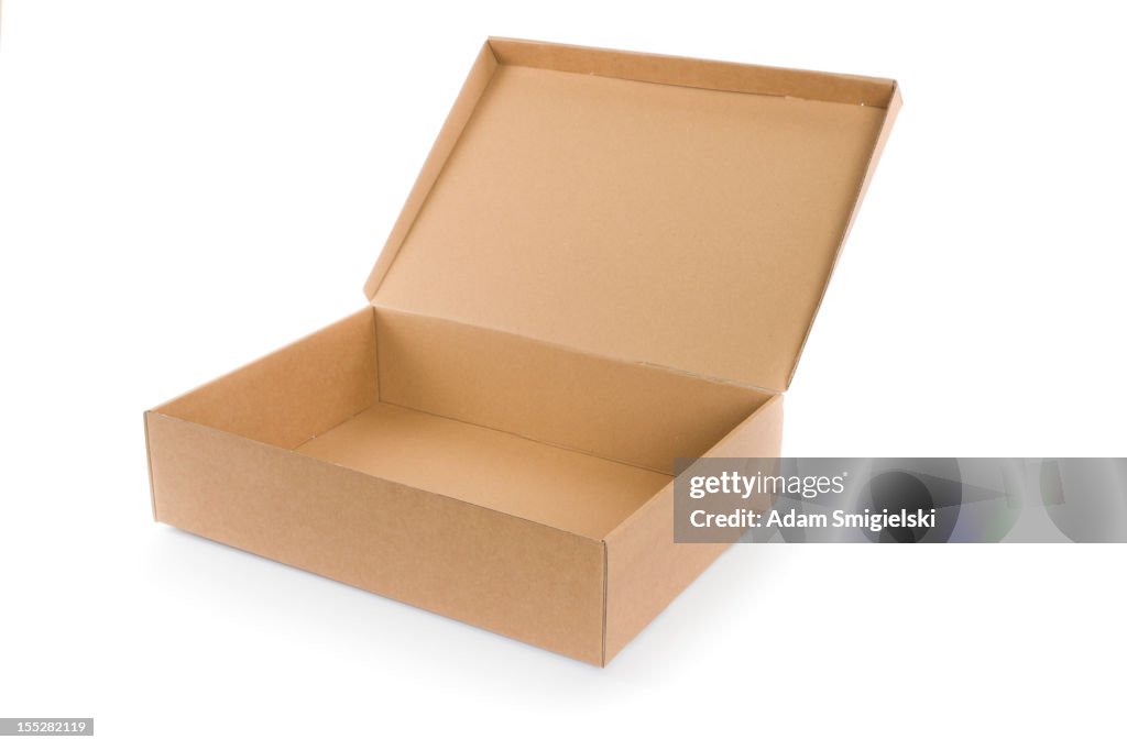 Empty open cardboard box isolated on white