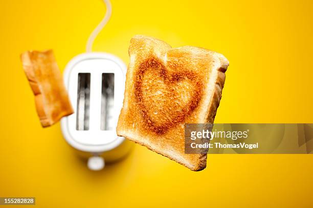 jumping toast bread - love valentine's day - bread love stockfoto's en -beelden