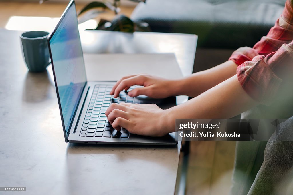 Man using screen laptop at home