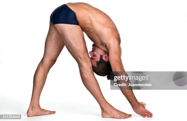 hot yoga pose (dandayamana janushirasana) - bikram yoga stock pictures, royalty-free photos & images