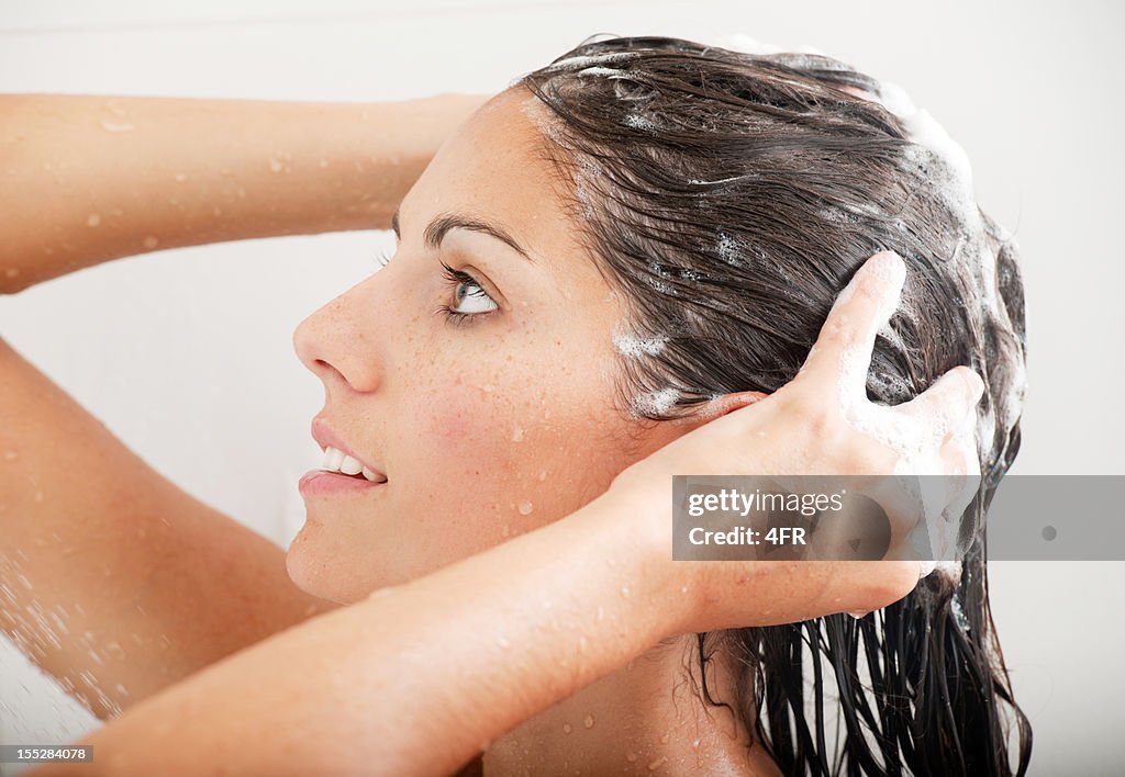 Woman washing her Hair with Shampoo under the shower (XXXL)