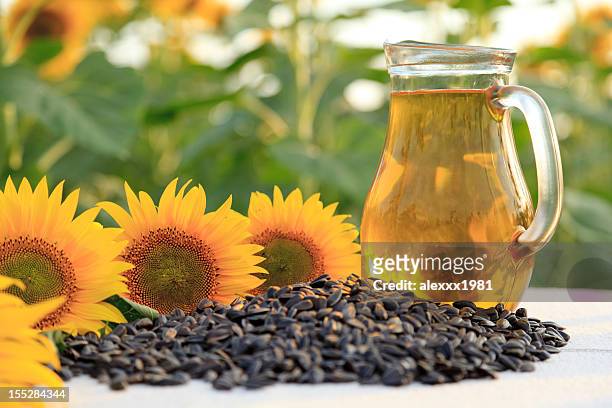 sunflower oil - vegetable oil stock pictures, royalty-free photos & images