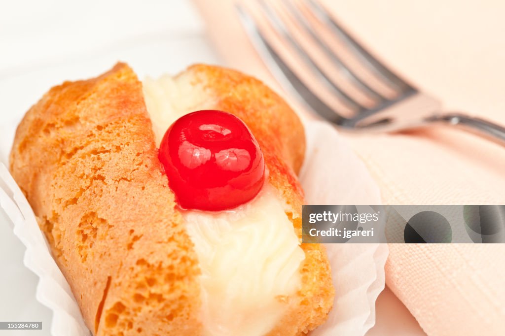 Baba au rum with a white background