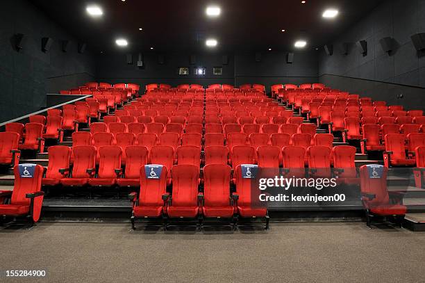 red theatre seats - attending play stock pictures, royalty-free photos & images