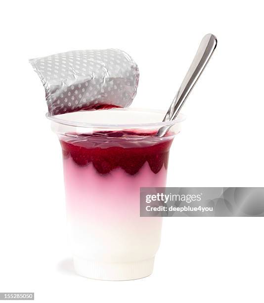 cherry yogurt in a plastic container on white - yogurt container stock pictures, royalty-free photos & images